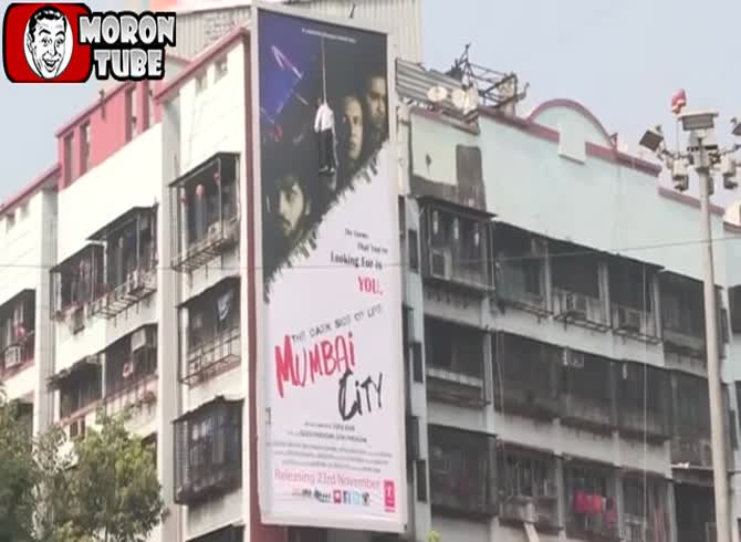 Video :A guy recently hung himself on the front of a building in India